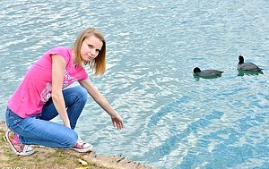 Scrawny young girl flashing her delicate breasts while in public