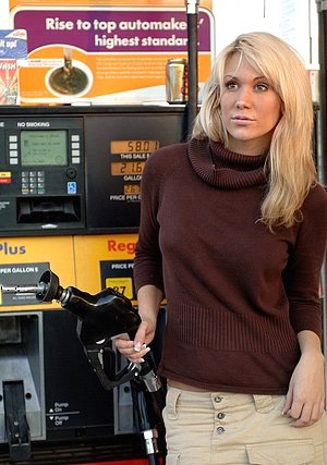 Blonde pumping gas and showing her perfect ass while in public